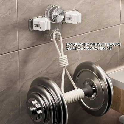Wall-mounted broom holder organising multiple cleaning tools in laundry room