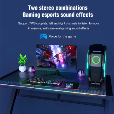 Wireless magnetic speaker on gaming desk with RGB-lit PC, keyboard, and mouse, perfect for lifestyle products and home decor