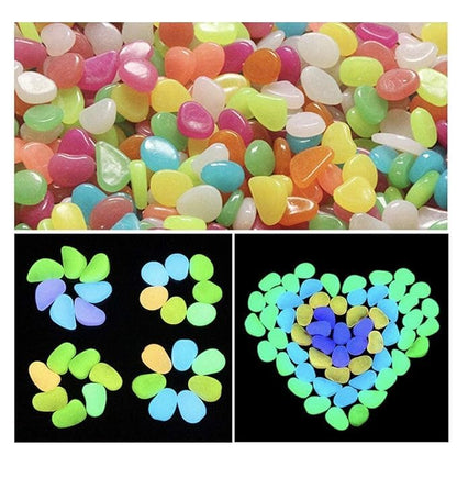 Colorful glossy garden rocks glowing in vibrant greens, blues, and yellows